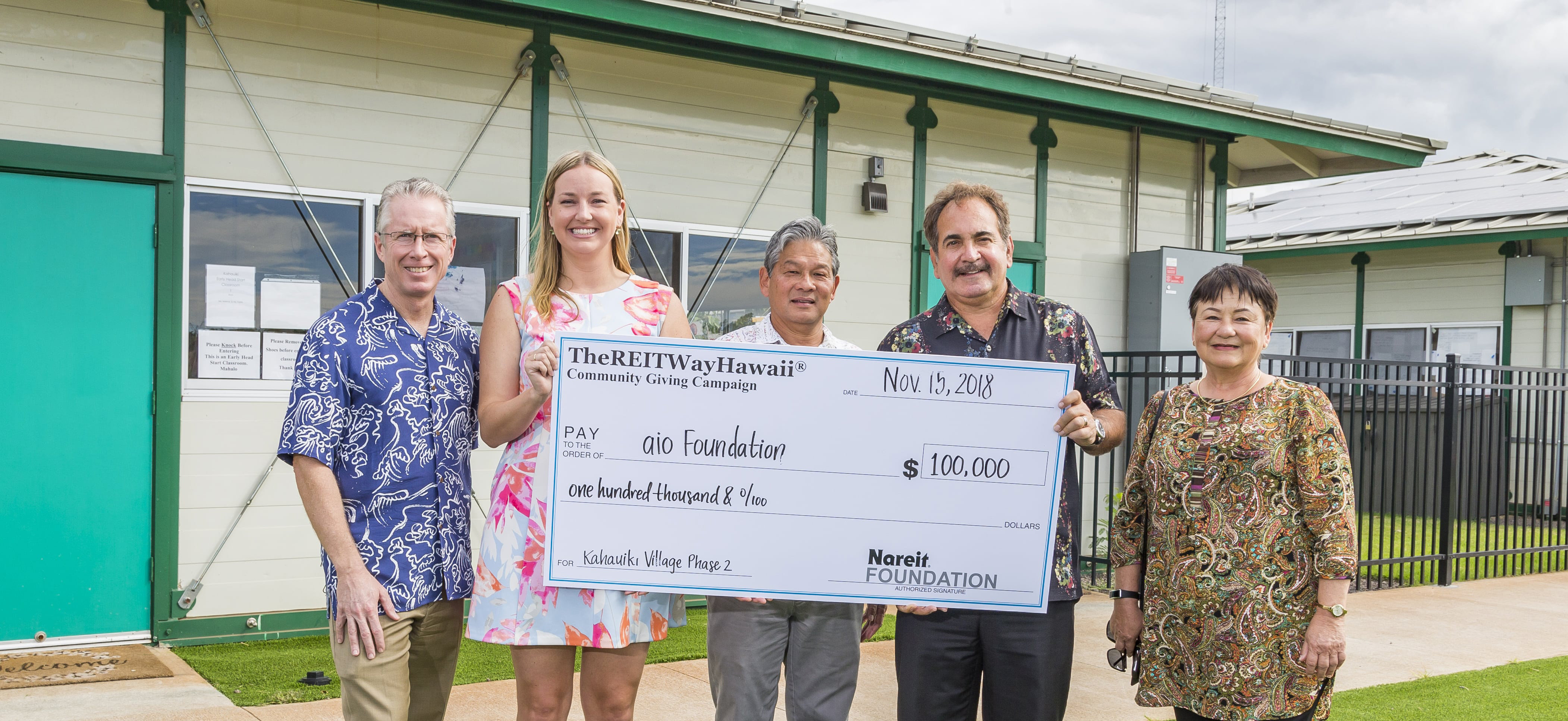 The REIT Way Hawaii Community Giving Camapaign Check presentation